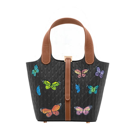 اسود و تان / فراشة